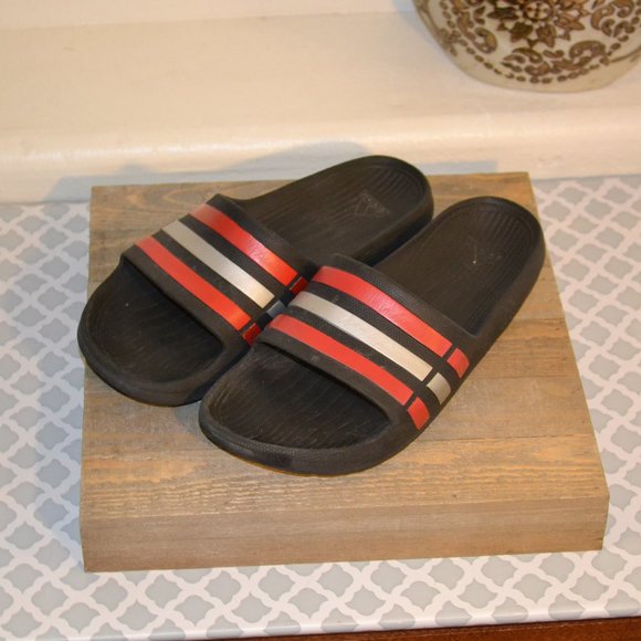 black and red adidas slides